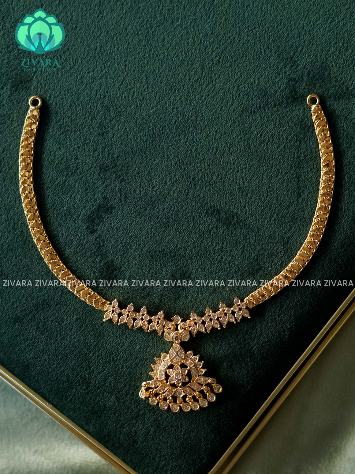 AMBIGAI- WHITE STONE PEACOCK MOTIF MICROGOLD POLISH ATTIGAI WITH EARRING - Zivara Fashion- latest jewellery design