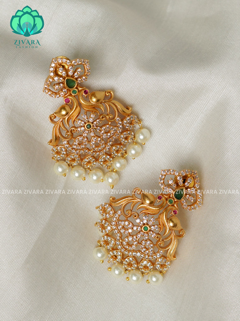 Gold peacock dangler- TRADITIONAL PREMIUM MATTE  polish STUDS- latest jewellery collection- zivara fashion