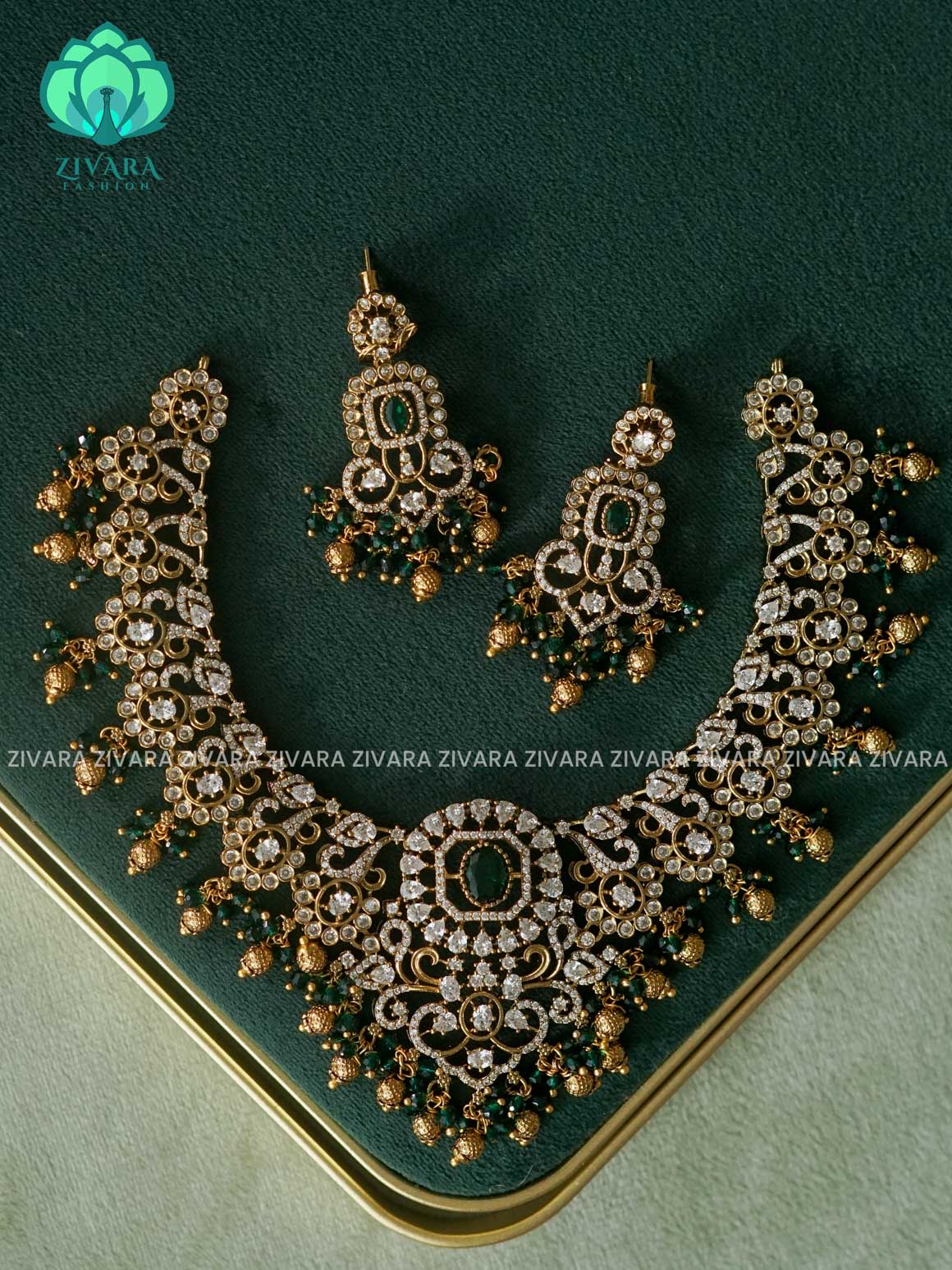 AKSHAYAM -  WHITE GREEN STONE BRIDAL NECKWEAR WITH GREEN GOLD BEADS HANGINGS  - Traditional south indian premium neckwear with earrings- Zivara Fashion- latest jewellery design.