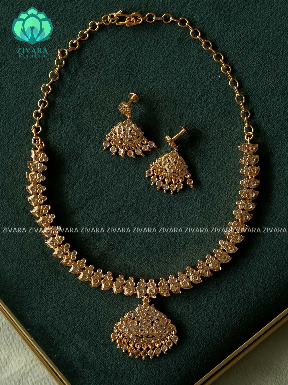 AMBIGAI-WHITE STONE MANGA MOTIF MICROGOLD POLISH ATTIGAI WITH EARRING - Zivara Fashion- latest jewellery desigN