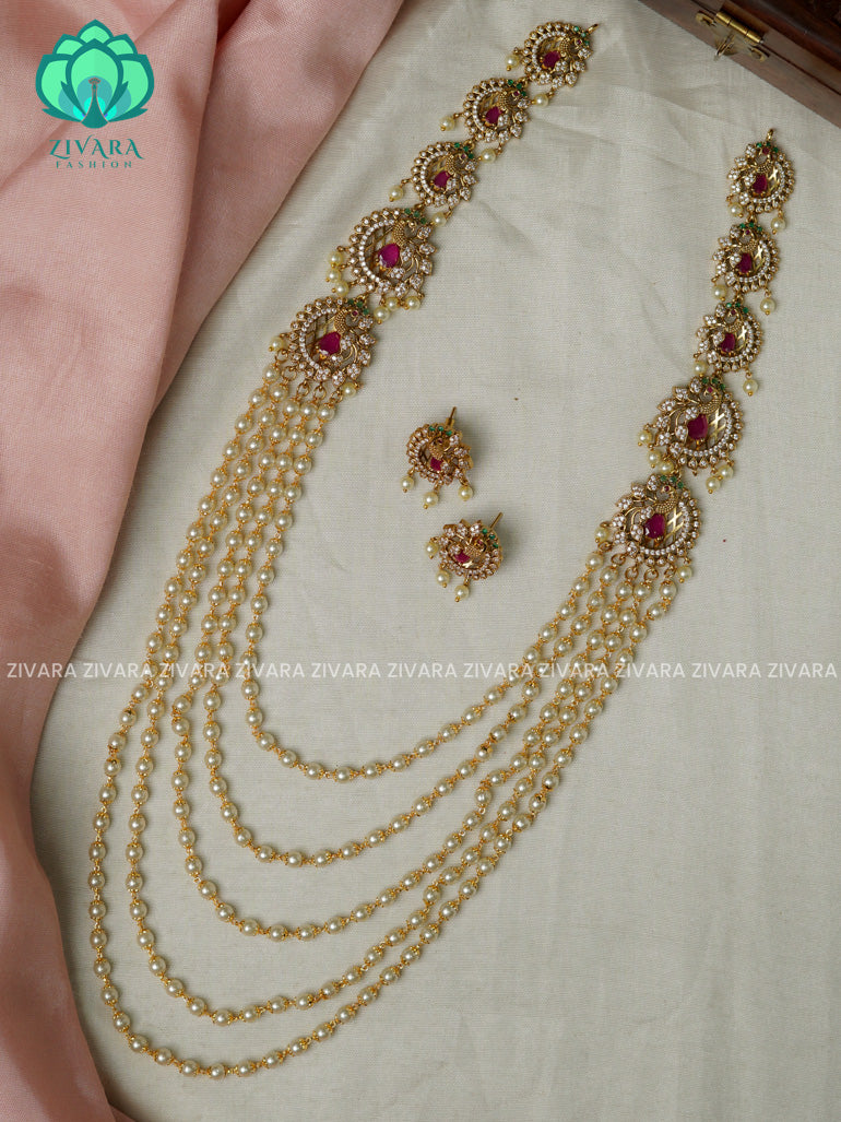 RUBY AND GREEN- PEACOCK -STEP PEARL CHAIN - Traditional PREMIUM MATTE polish MIDCHEST haaram/neckwear with earrings- Zivara Fashion