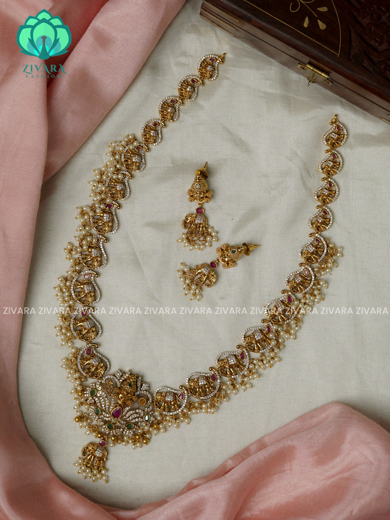 TIRUMAL PENDANT- Traditional PREMIUM MATTE polish MIDCHEST haaram/neckwear with earrings- Zivara Fashion