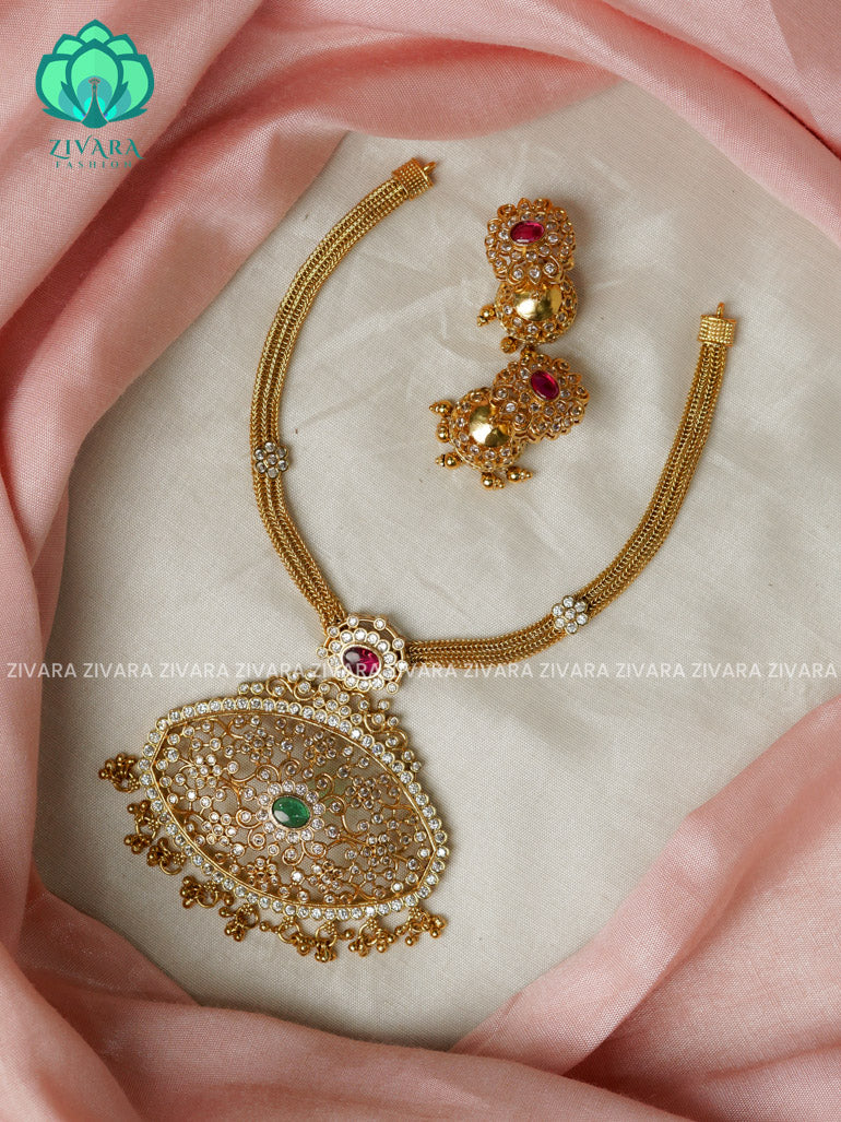 jumbo oval pendant flexible chain- Traditional south indian premium neckwear with earrings- Zivara Fashion- latest jewellery design
