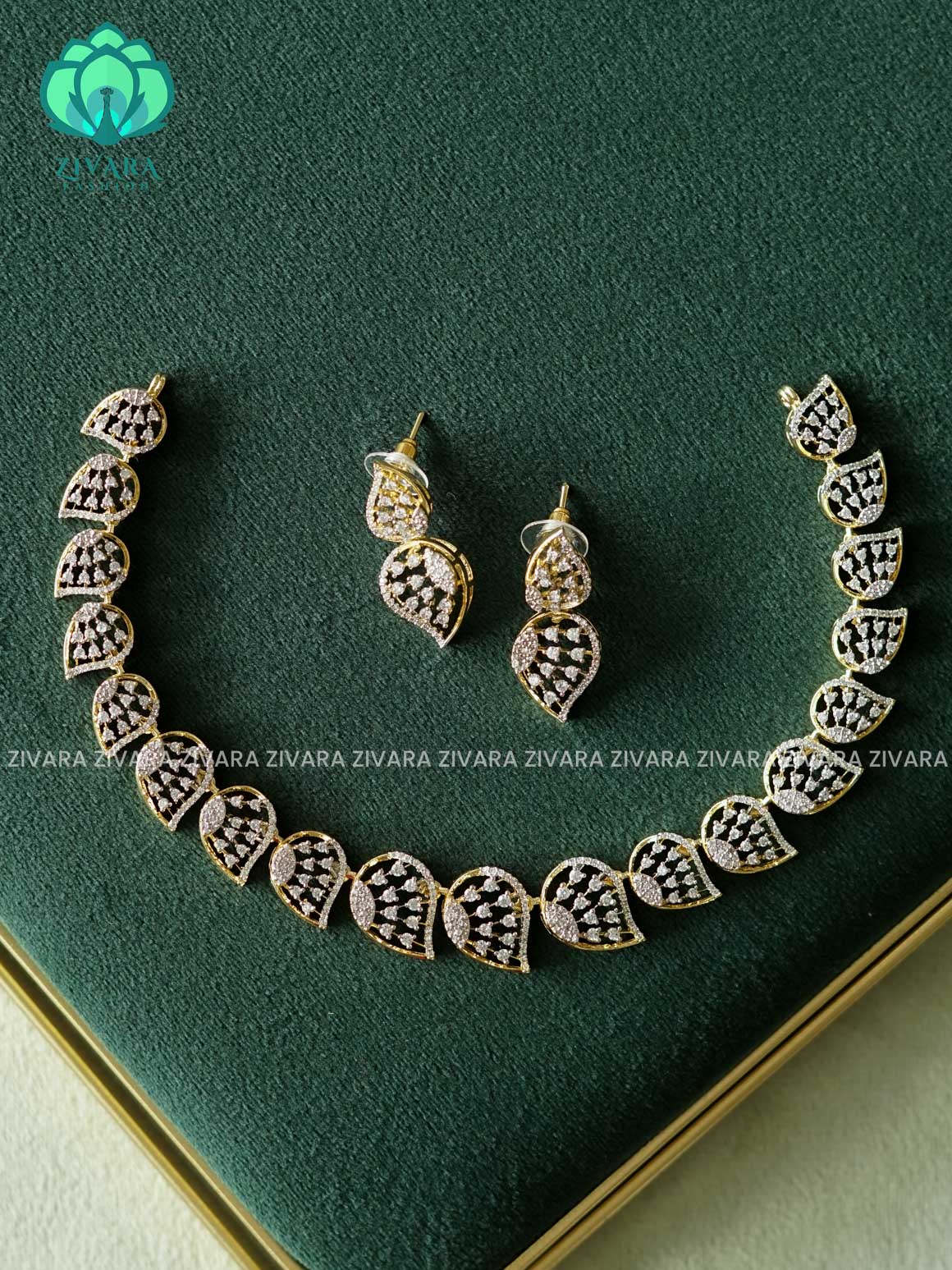 WHITE STONE LEAF - AD MICROGOLD POLISH WITH EARRING - Zivara Fashion- latest jewellery design