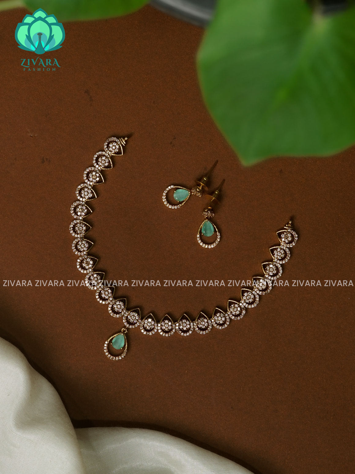 PASTEL GREEN TEAR PENDANT - stylish and minimal elegant neckwear with earrings- Zivara FashioN