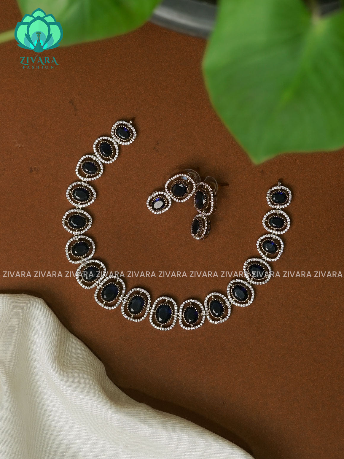 BLUE OVAL STONE -PREMIUM SUBTLE GOLD FINISH  stylish and minimal elegant neckwear with earrings- Zivara Fashion