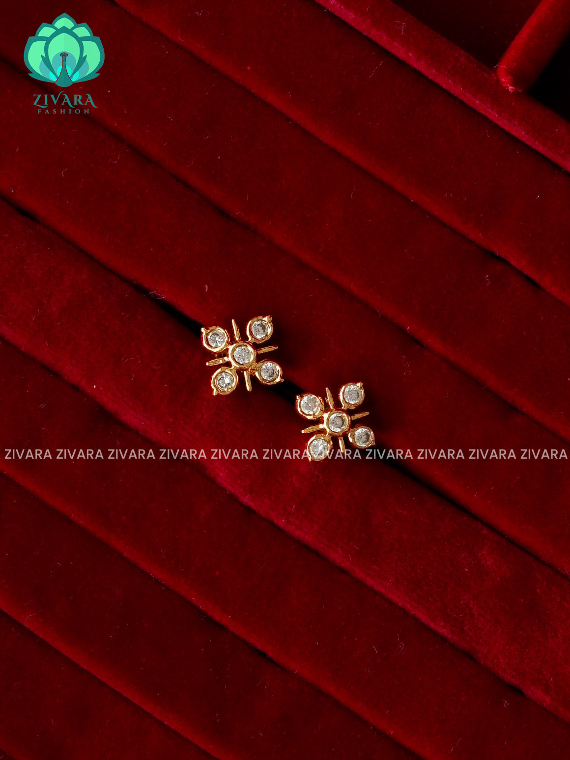 ZYRA- MEDIUM SIZE WHITE STONE FLORAL MICRO  GOLD POLISH STUD - latest jewellery collection- zivara fashion