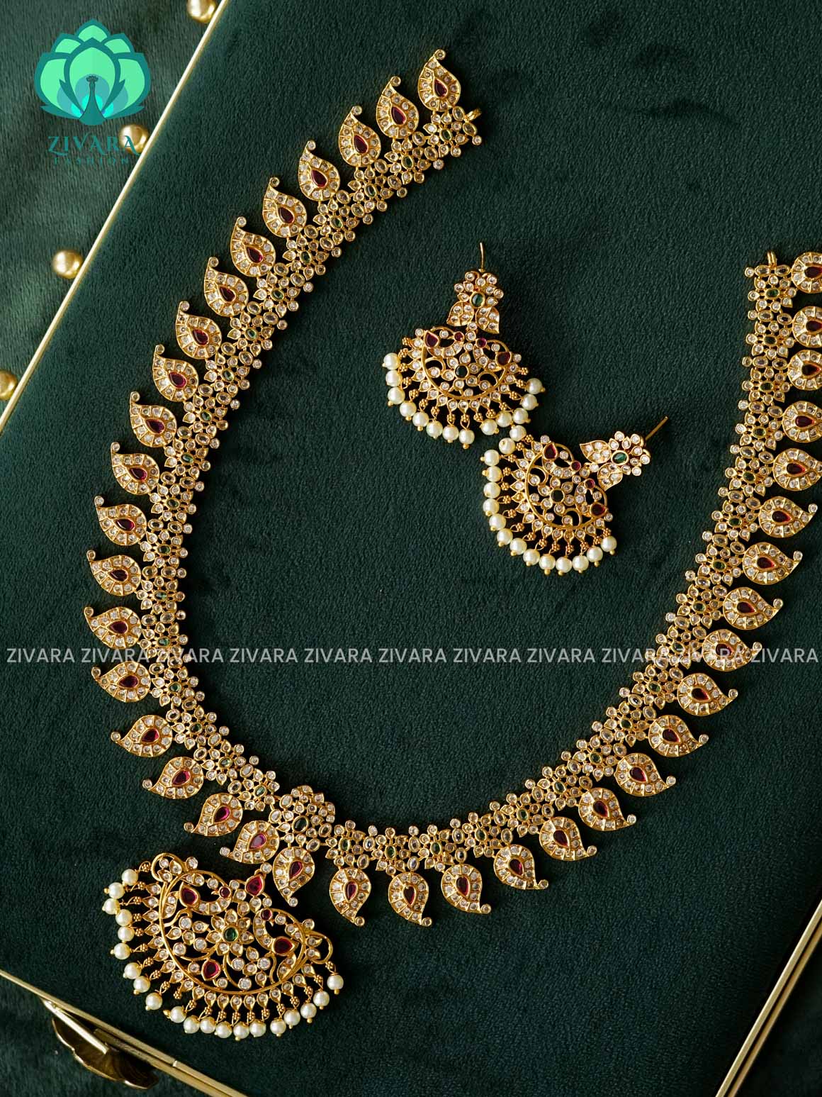 RUBY GREEN WHITE STONE MANGO WITH PEACOCK MOTIF PENDANT  - Traditional PREMIUM MATTE polish MIDCHEST haaram/neckwear with earrings- Zivara Fashion