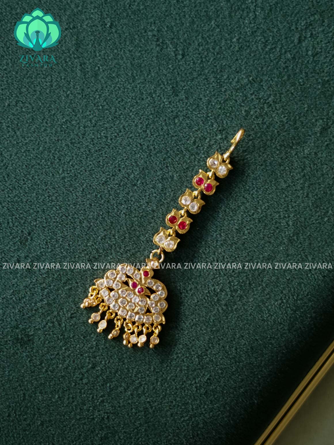 AMBIGAI- RUBY WHITE GREEN PEACOCK MOTIF IMPON TIKKA/CHUTTI MICROGOLD POLISH bridal head accessory- latest bridal collection - Zivara fashion