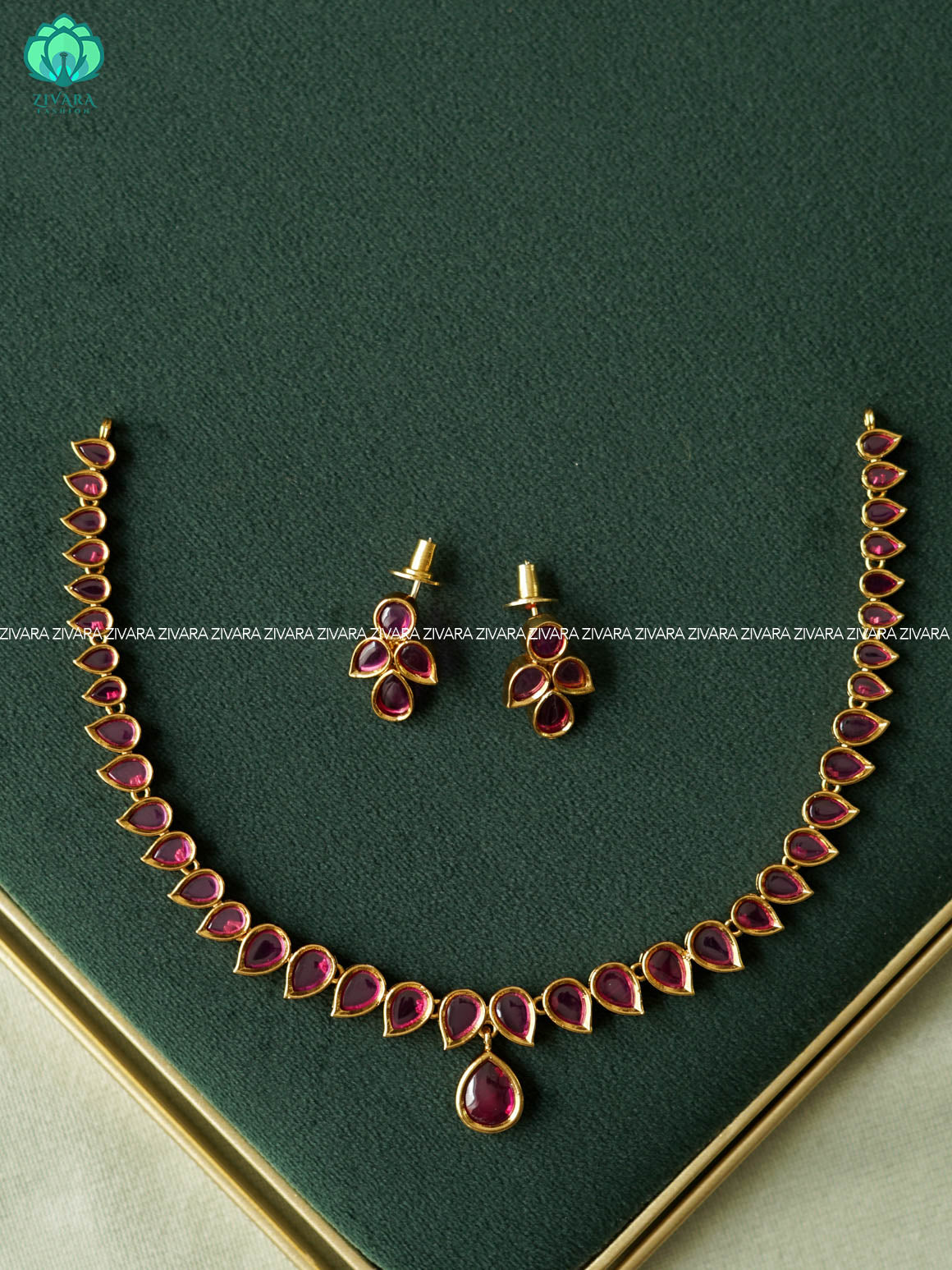 RUBY STONE LEAF HOTSELLING -PREMIUM SUBTLE GOLD FINISH  stylish and minimal elegant neckwear with earrings- Zivara Fashion