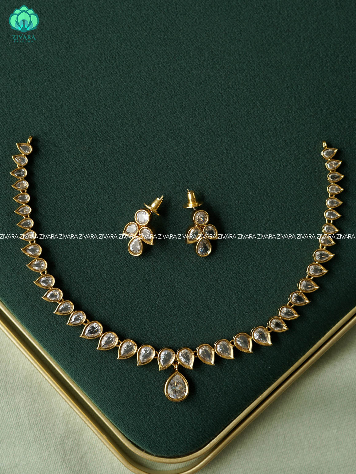 WHITE STONE LEAF HOTSELLING -PREMIUM SUBTLE GOLD FINISH  stylish and minimal elegant neckwear with earrings- Zivara Fashion