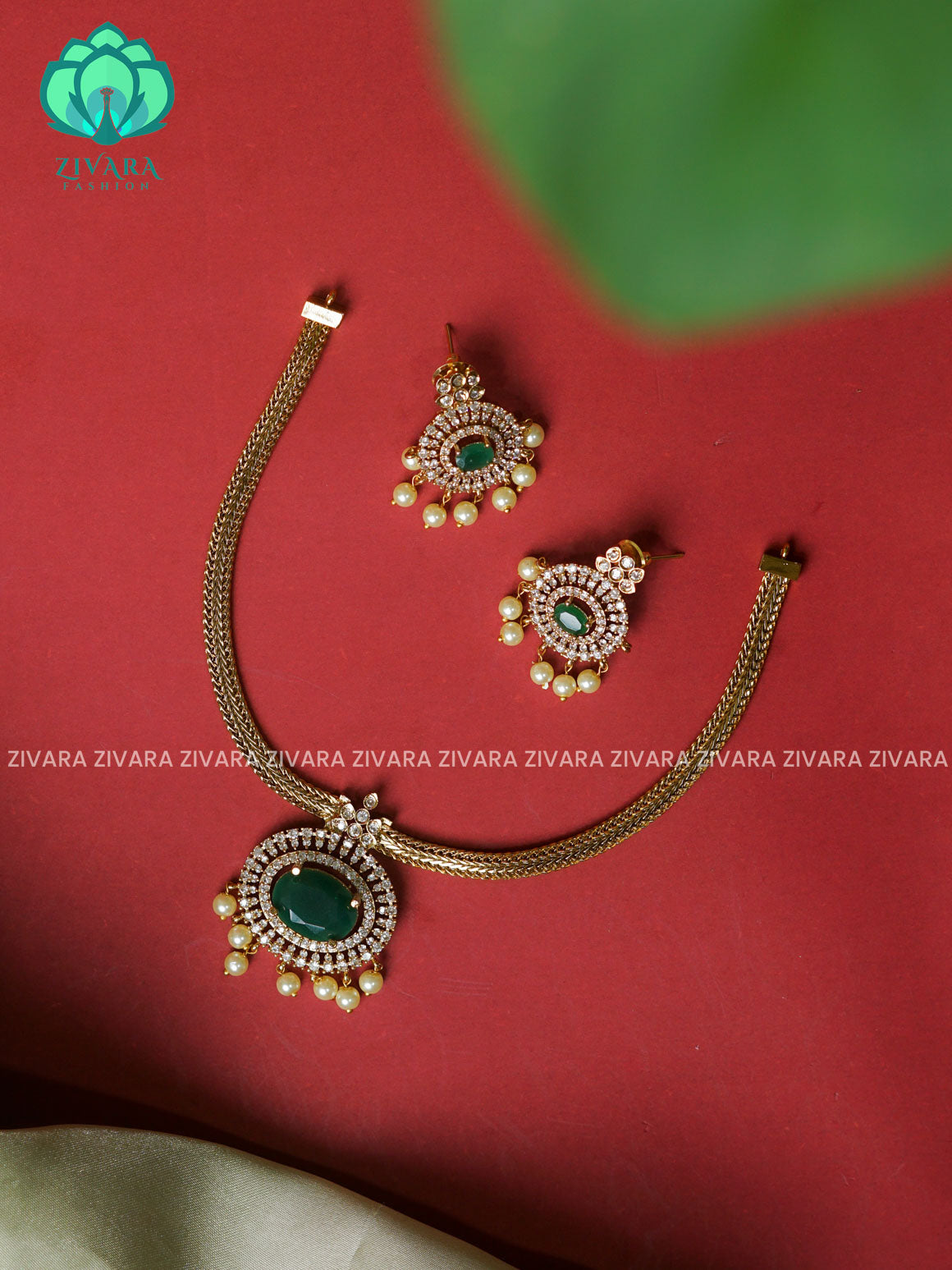 GREEN- FLEXIBLE CHAIN AND OVAL PENDANT  -Traditional south indian premium neckwear with earrings- Zivara Fashion- latest jewellery design