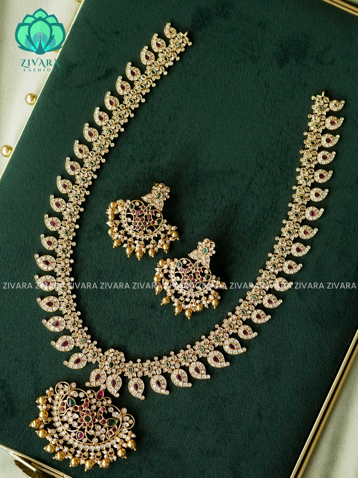 RUBY GREEN STONE MANGO WITH PEACOCK MOTIF PENDANT  - Traditional PREMIUM MATTE polish MIDCHEST haaram/neckwear with earrings- Zivara Fashion