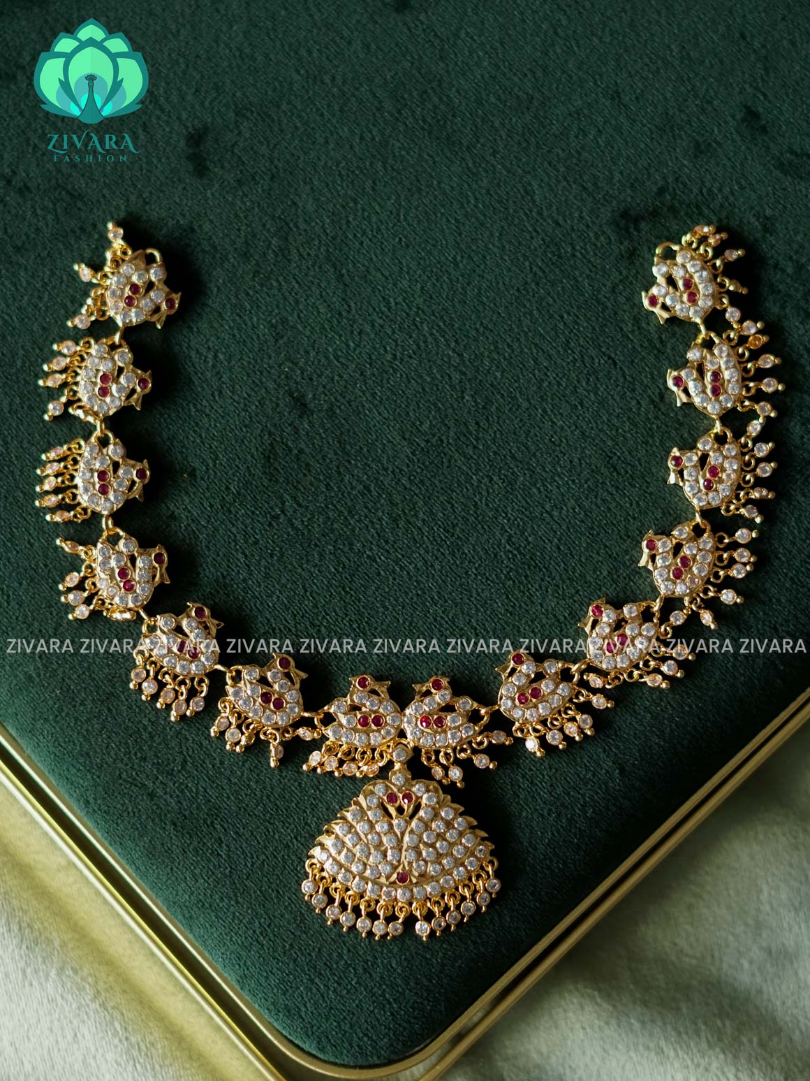 AMBIGAI-RUBY WHITE STONE PEACOCK MOTIF MICROGOLD POLISH ATTIGAI WITHOUT EARRING - Zivara Fashion- latest jewellery desigN