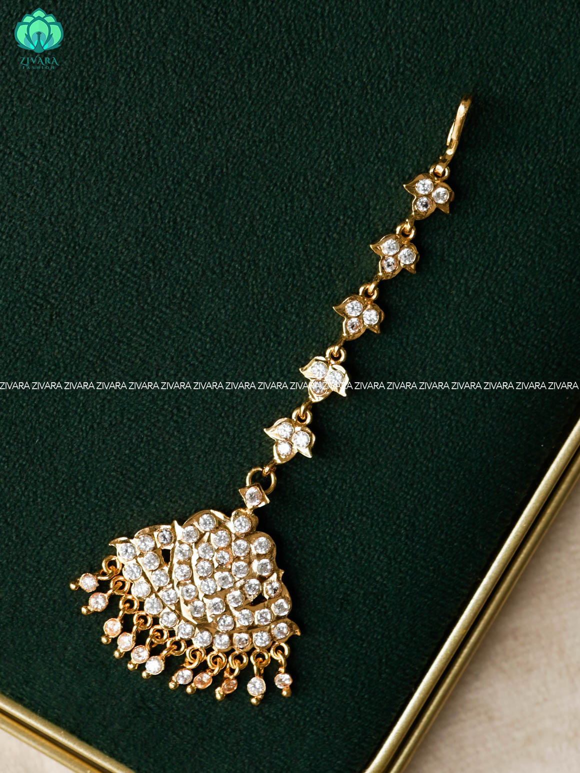 AMBIGAI- WHITE STONE TIKKA/CHUTTI MICROGOLD POLISH bridal head accessory- latest bridal collection - Zivara fashion