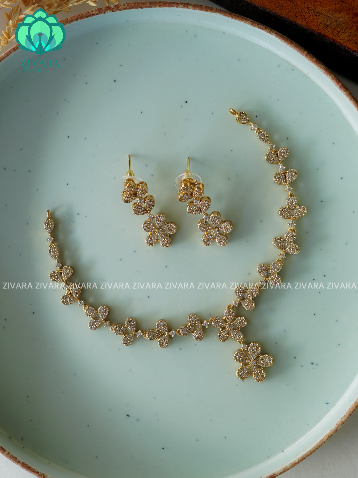WHITE FLOWER -PREMIUM SUBTLE GOLD FINISH  stylish and minimal elegant neckwear with earrings- Zivara FashioN