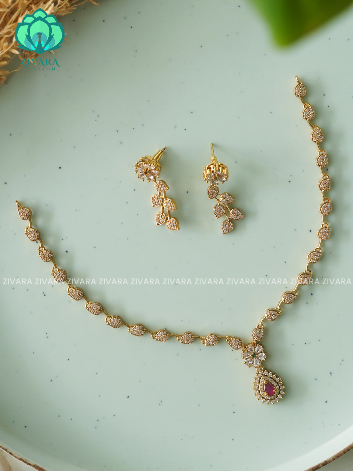 RUBY SIMPLE LEAFY AND TEAR PENDANT- stylish and minimal elegant neckwear with earrings- Zivara FashioN