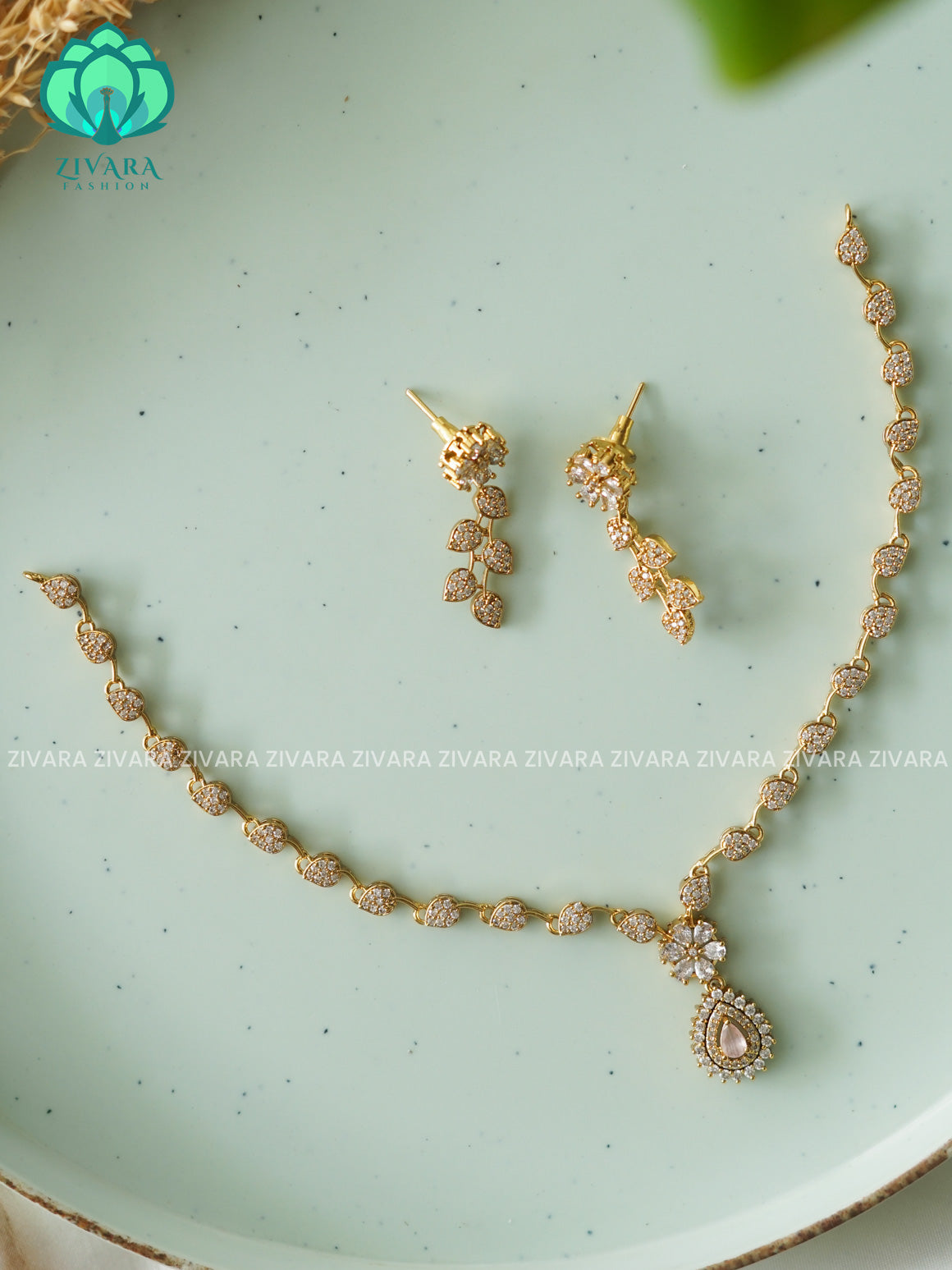 PASTEL PINK SIMPLE LEAFY AND TEAR PENDANT- stylish and minimal elegant neckwear with earrings- Zivara FashioN