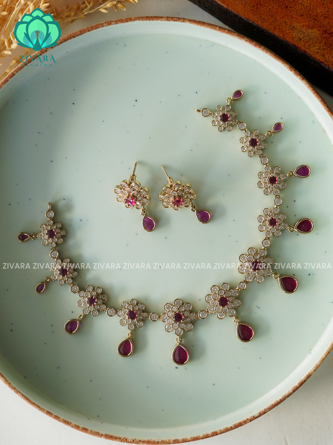 RUBY -HANGING TEAR AND FLOWER - GOLD FINISH stylish and minimal elegant neckwear with earrings- Zivara Fashion