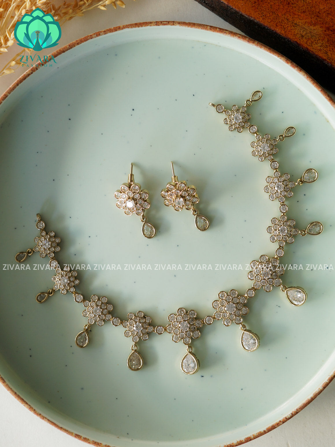 WHITE -HANGING TEAR AND FLOWER - GOLD FINISH stylish and minimal elegant neckwear with earrings- Zivara Fashion
