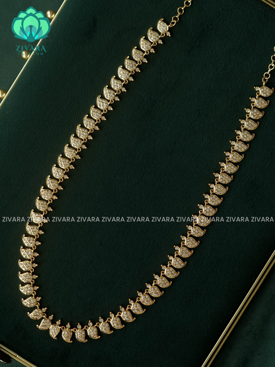 AMBIGAI -  RUBY WHITE STONE  MICROGOLD POLISH LONG HAARAM   -Traditional south indian premium HAARAM- Zivara Fashion- latest jewellery design