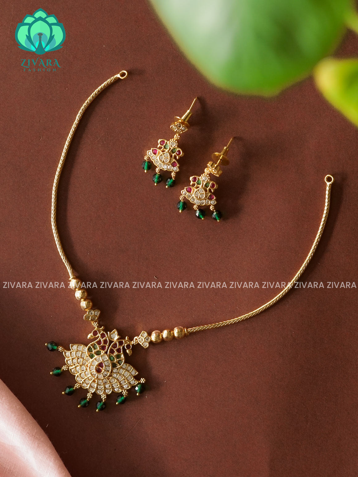 Flexible chain PEACOCK WITH GREEN BEADS  pendant -Traditional south indian premium neckwear with earrings- Zivara Fashion- latest jewellery design.