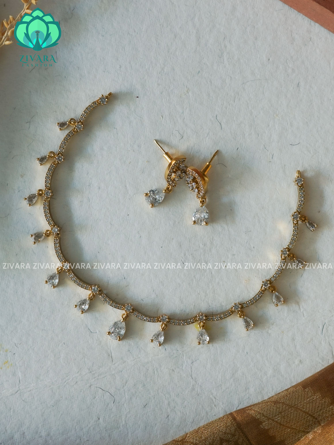 WHITE  TEAR GLAMOUROUS  -PREMIUM SUBTLE GOLD FINISH  stylish and minimal elegant neckwear with earrings- Zivara FashioN