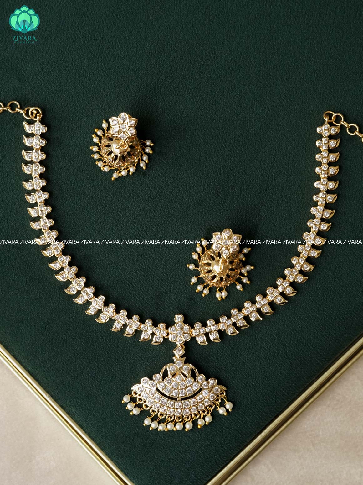 AMBIGAI-  WHITE STONE MANGO MOTIF MICROGOLD POLISH ATTIGAI WITH JHUMKA - Zivara Fashion- latest jewellery design