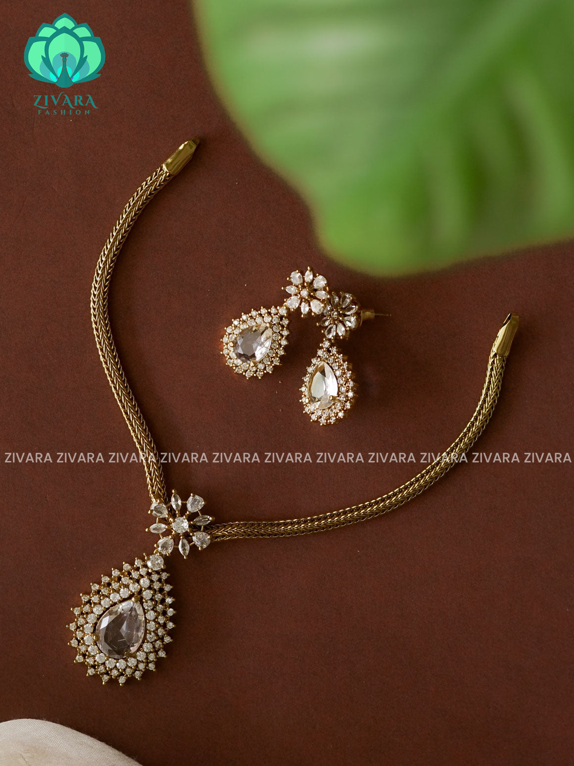 WHITE BIG TEAR PENDANT KIDS FRIENDLY GREEN PENDANT WITH FLEXIBLE CHAIN   -  Traditional south indian premium neckwear with earrings- Zivara Fashion- latest jewellery design