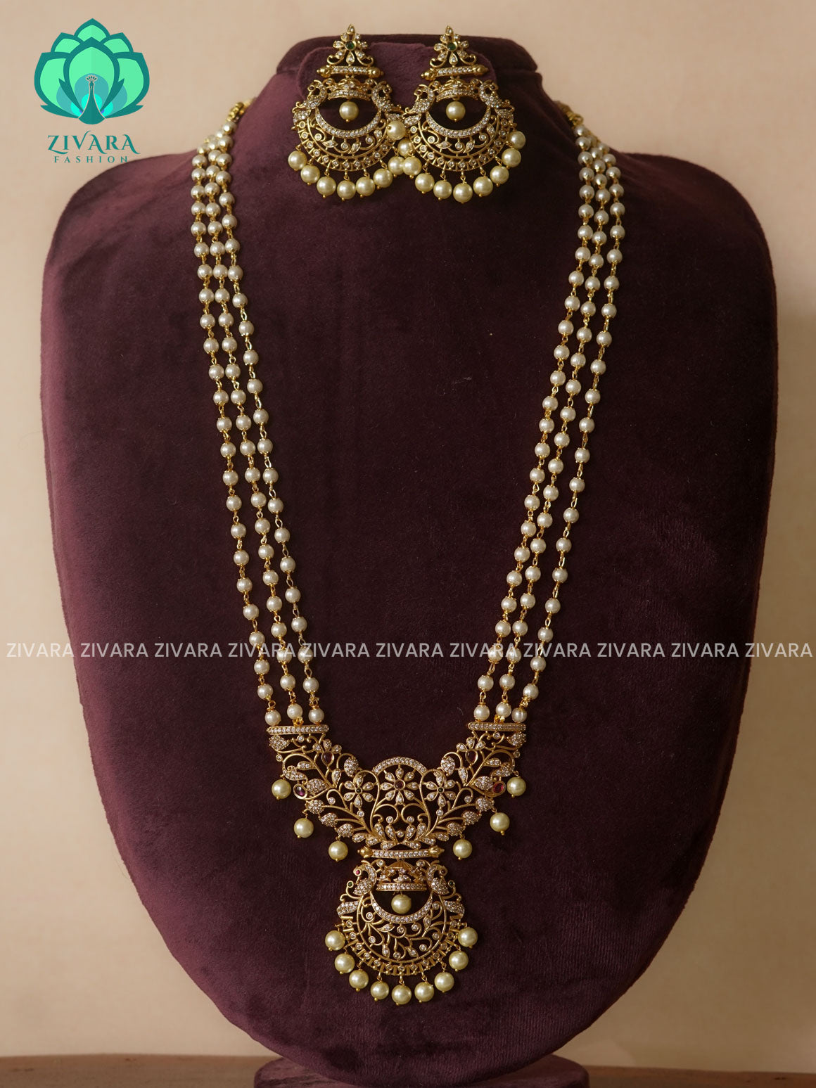 RUBY AND GREEN- PEACOCK -PEARL CHAIN - Traditional PREMIUM MATTE polish MIDCHEST haaram/neckwear with earrings- Zivara Fashion