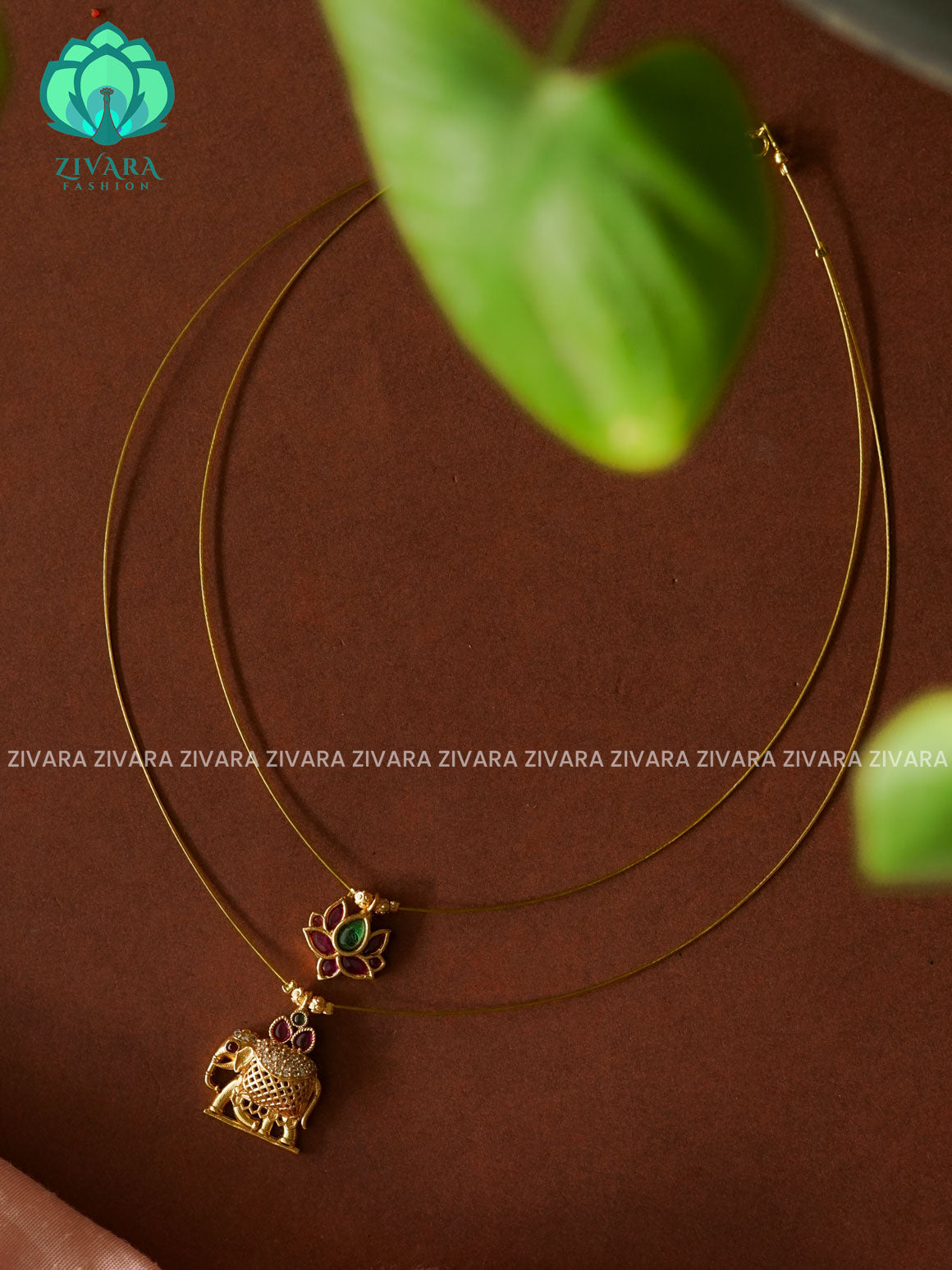 ELEPHANT AND LOTUS  TAMARA INVISIBLE MINIMAL ELEGANT HANDMADE NECKLACE WITH BRILLIANT FINISH MOTIFS- ZIVARA FASHION