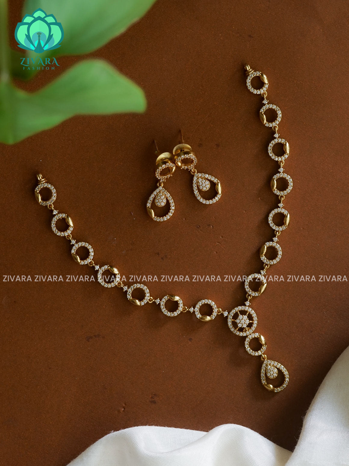 WHITE STONE CIRCLE   SUBTLE GOLD FINISH stylish and minimal elegant neckwear with earrings- Zivara Fashion