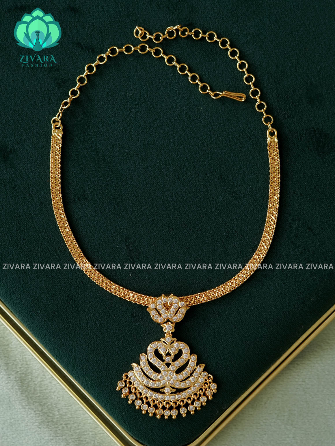 AMBIGAI- WHITE STONE PEACOCK MOTIF MICROGOLD POLISH ATTIGAI - Zivara Fashion- latest jewellery design