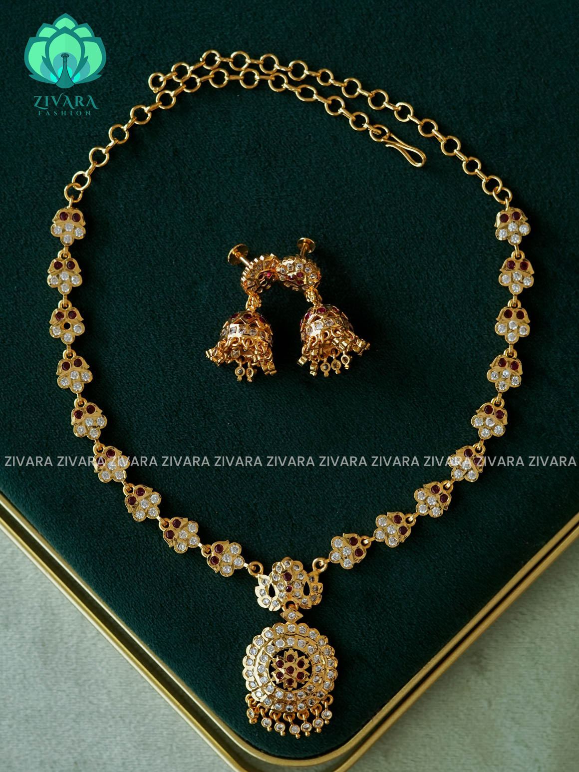 AMBIGAI-WHITE RUBY AND GREEN STONE PEACOCK MOTIF MICROGOLD POLISH ATTIGAI - Zivara Fashion- latest jewellery design