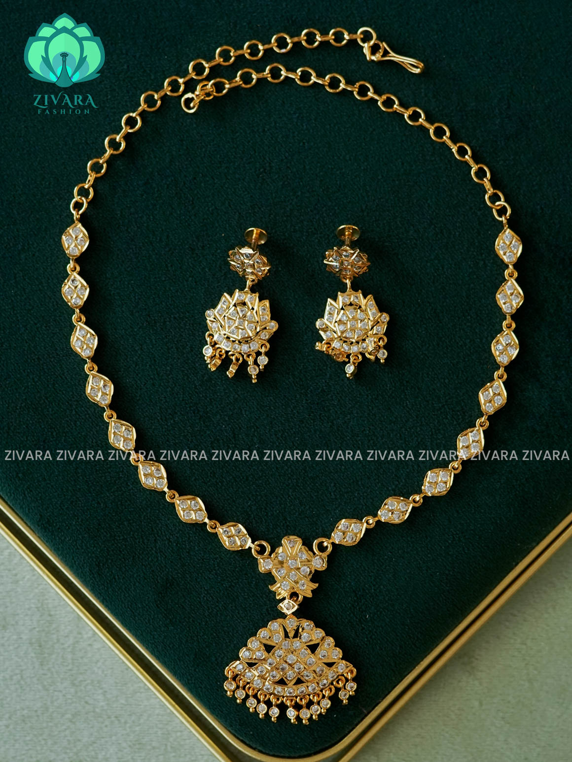 AMBIGAI-WHITE STONE MANGA MOTIF MICROGOLD POLISH ATTIGAI WITH EARRING - Zivara Fashion- latest jewellery design
