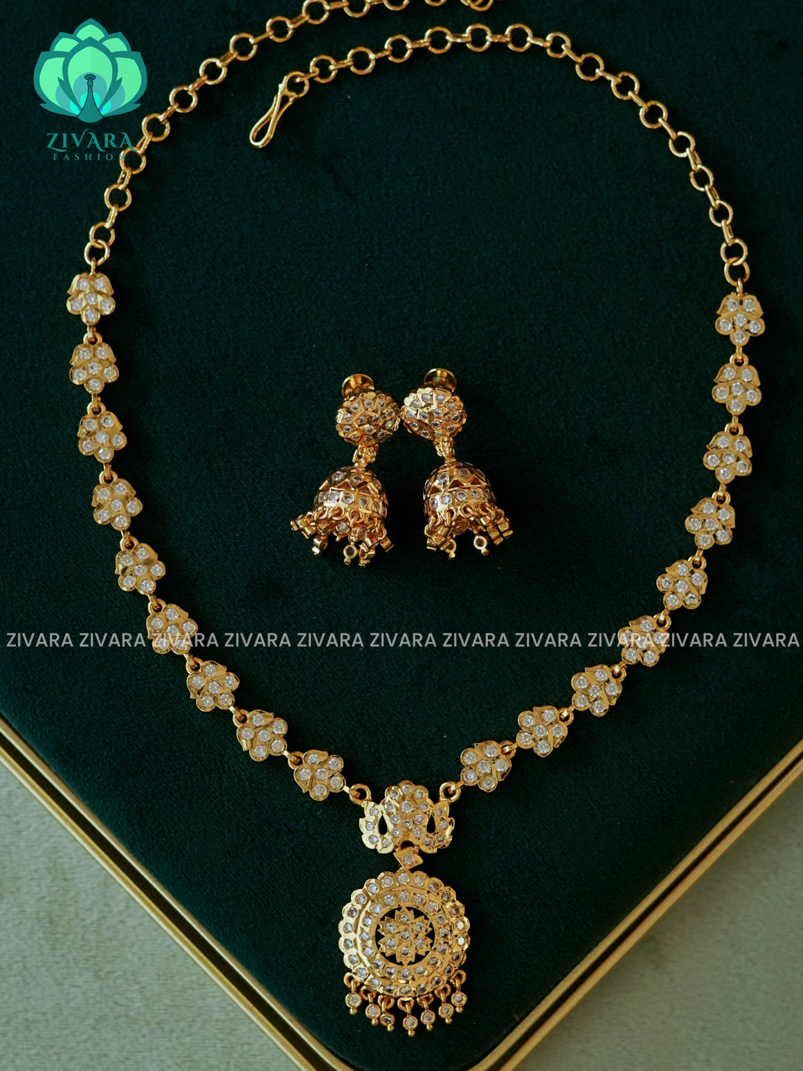 AMBIGAI-WHITE RUBY AND GREEN STONE PEACOCK MOTIF MICROGOLD POLISH ATTIGAI - Zivara Fashion- latest jewellery design