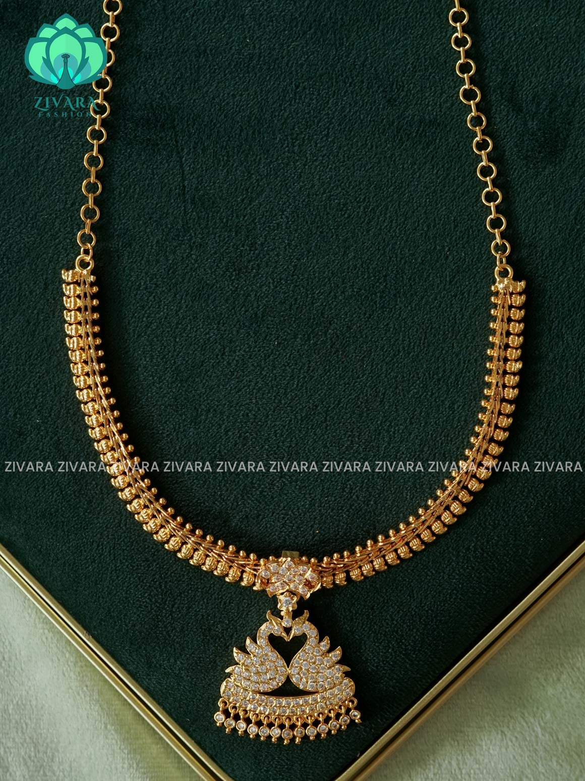 AMBIGAI  -  WHITE  STONE PEACOCK  MICROGOLD POLISH FLEXIBLE CHAIN  ATTIGAI - Zivara Fashion- latest jewellery design