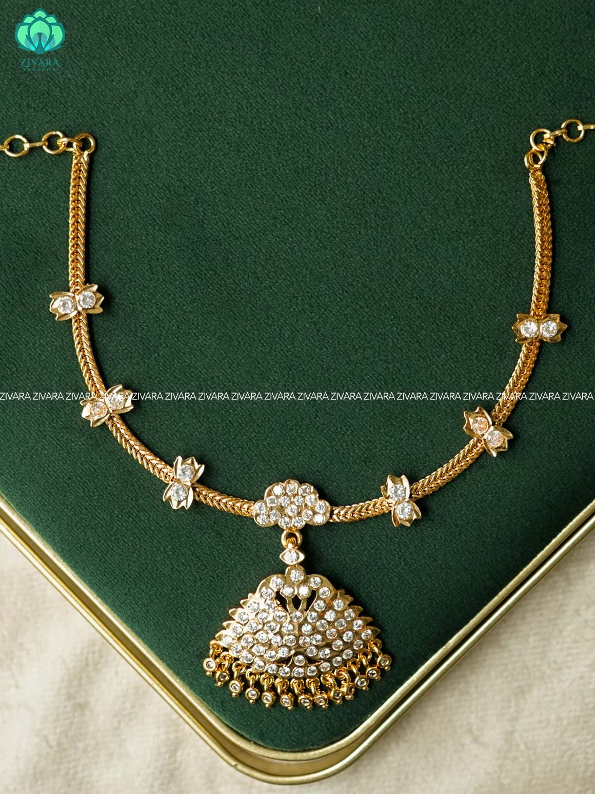 AMBIGAI- PEACOCK WHITE STONE MICROGOLD POLISH ATTIGAI - Zivara Fashion- latest jewellery design