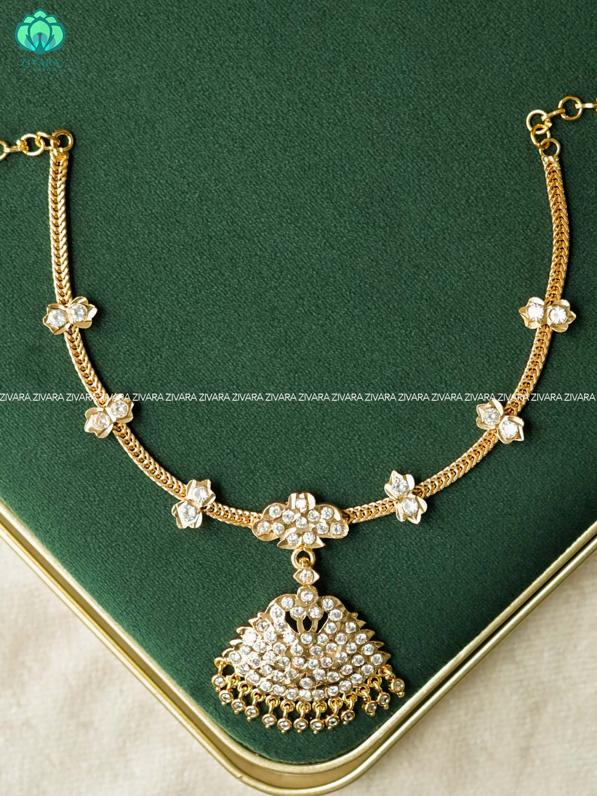 AMBIGAI- PEACOCK WHITE STONE MICROGOLD POLISH ATTIGAI - Zivara Fashion- latest jewellery design