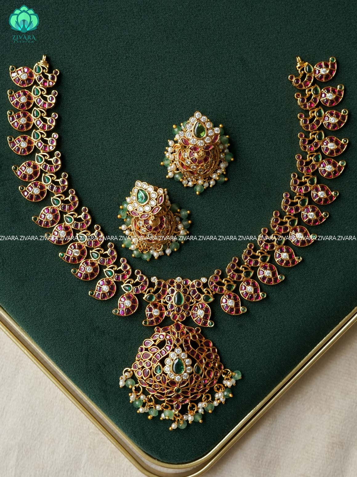 RUBY GREEN WHITE STONE MANGO WITH PEACOCK MOTIF PENDANT  - Traditional PREMIUM MATTE polish neckwear with earrings- Zivara Fashion