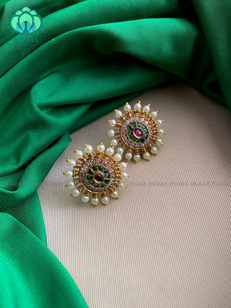 GREEN STONE OVAL STUDS -  latest jewellery collection